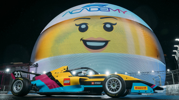 The 2026 LEGO F1 Academy car posed in front of a smiling lego face sphere