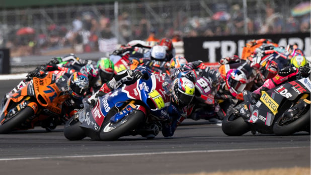 Filip Salac (12) battles rivals on track at Silverstone in a 2026 Moto2 race — Photo: © IMAGO