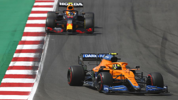 Lando Norris leads Sergio Perez in the Portuguese Grand Prix