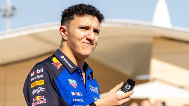 Isack Hadjar looks on from the Bahrain paddock — Photo: © IMAGO