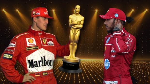 Michael Schumacher holds an Oscar statue as Lewis Hamilton looks on — Photo: © IMAGO