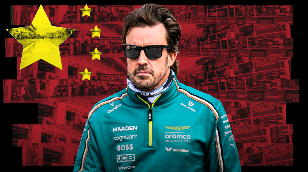 Fernando Alonso in Aston Martin teamwear pictured in front of a Chinese flag — Photo: © IMAGO