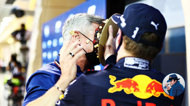 Verstappen pushing a cake in Coulthards face