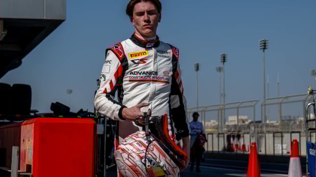 Cian Shields looking disappointed in his race gear after an F2 race