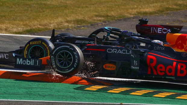 Max Verstappen and Lewis Hamilton fighting before the crash
