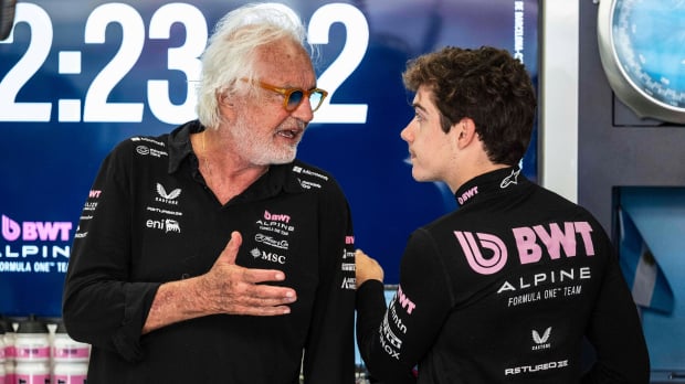 Briatore and Colapinto in deep conversation in the Alpine garage