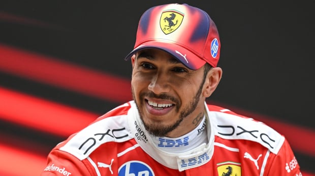 Lewis Hamilton grinning at the 2026 Chinese Grand Prix — Photo: © IMAGO