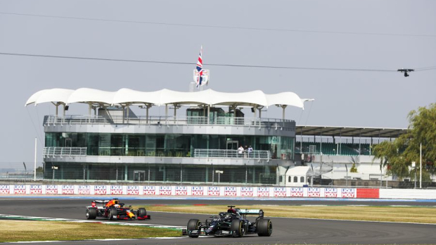 Lewis Hamilton leading Max Verstappen on Silverstone