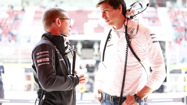 Andy Cowell talking with Toto Wolff in 2014
