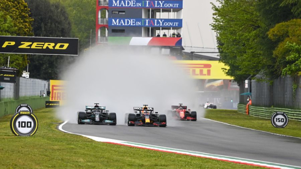 Lewis Hamilton fighting with Max Verstappen at Imola