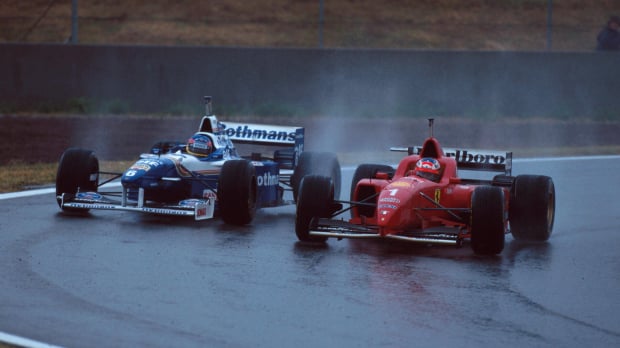 Michael Schumacher passes Jacques Villeneuve for the lead