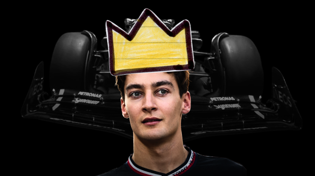 George Russell wears a crown in front of the Mercedes car