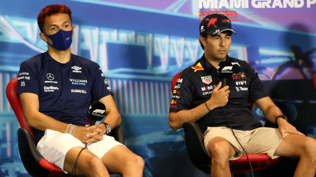 Alexander Albon and Sergio Pérez talking with the media