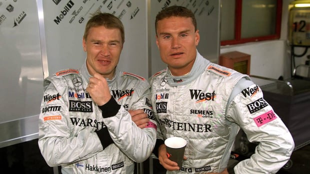 Hakkinen and Coulthard stood together in 2001 McLaren race suits