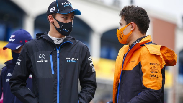 George Russell chats with Lando Norris