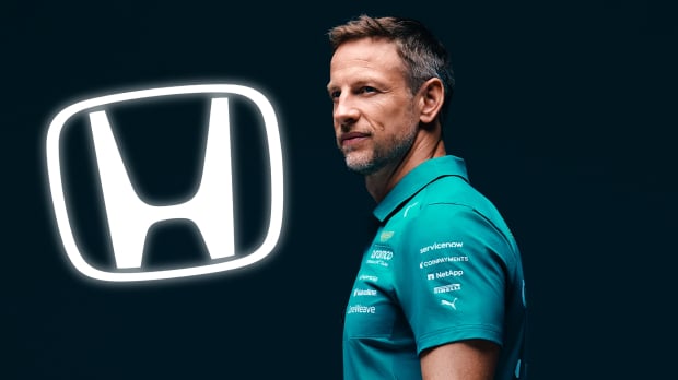Button in green Aston Martin f1 t-shirt looking sideways with black background and white glowing Honda logo to his left — Photo: © IMAGO