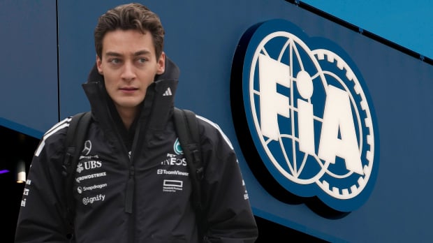 George Russell looks at the FIA logo — Photo: © IMAGO