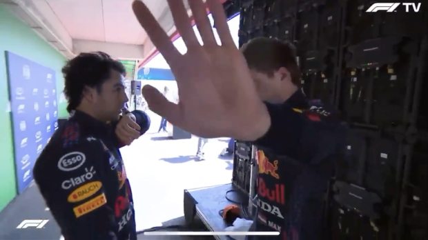 Verstappen shielding from the camera