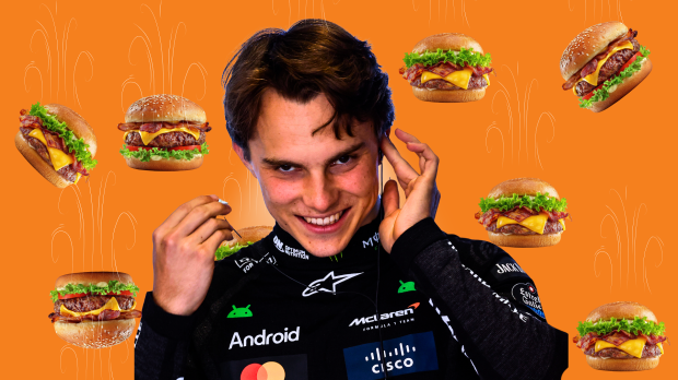 Oscar Piastri smiles as burgers fall around his head