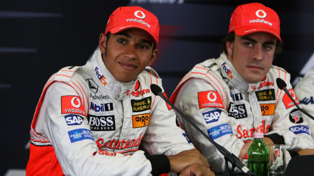 McLaren's Lewis Hamilton and Fernando Alonso look on from a 2007 Hungarian Grand Prix press conference — Photo: © IMAGO