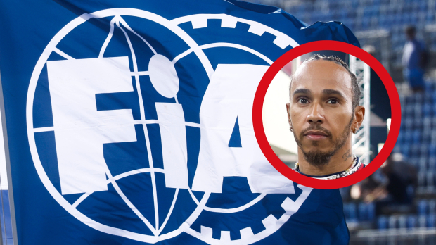 Lewis Hamilton looks glum as FIA flag flies behind