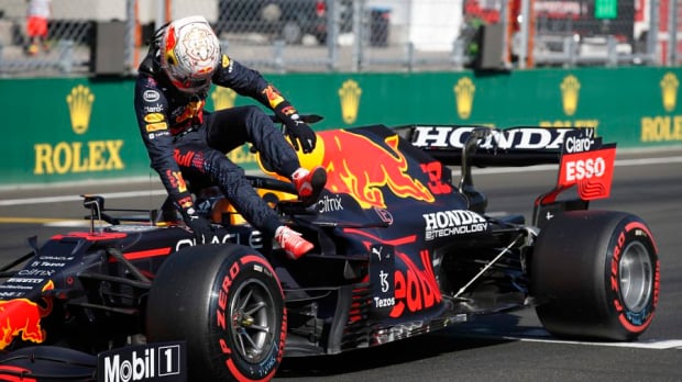 Verstappen jumps out of RB16B.