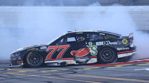 An image of NASCAR star Carson Hocevar doing a celebratory burnout after his first Cup Series win at Talladega Superspeedway — Photo: © IMAGO