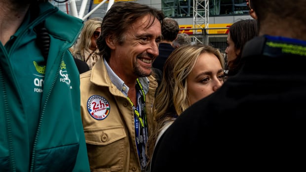 Richard Hammond smiles with his daughter Izzy on the grid at the 2024 British Grand Prix