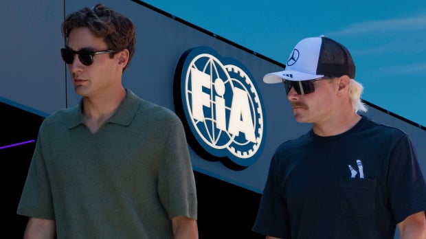 Valtteri Bottas and George Russell in front of the FIA logo — Photo: © IMAGO