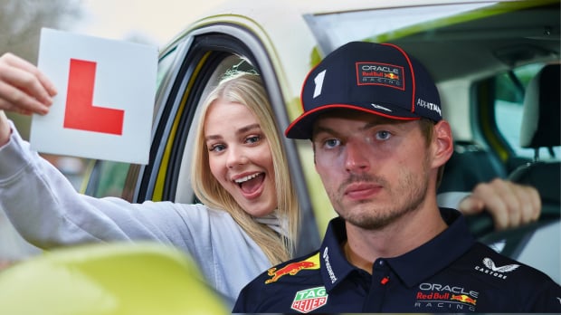 Max Verstappen is pictured in front of a car where a smiling girl holds up an L plate