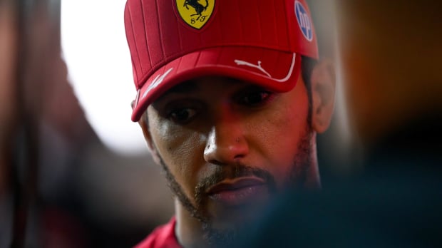 Lewis Hamilton looking downcast at the Qatar Grand Prix