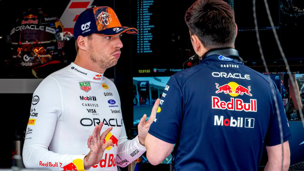 Max Verstappen shrugs his shoulders and looks in dismay at the Red Bull Garage in Spa — Photo: © IMAGO