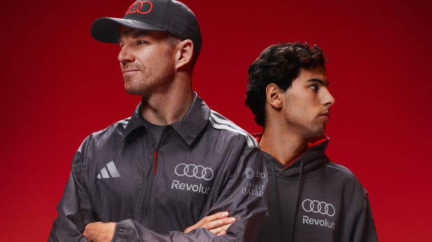 Credit: Audi. Hulkenberg and Bortoleto head to toe in Audi adidas F1 kit looking serious and facing separate ways