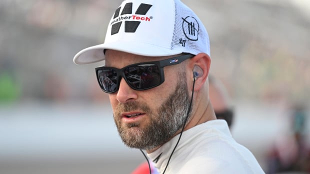 An image of NASCAR driver Shane van Gisbergen staring down the camera