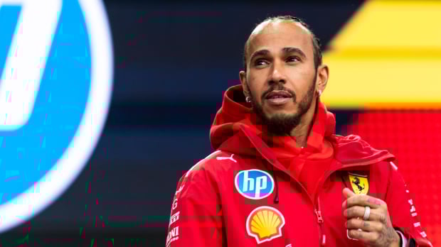 Lewis Hamilton looks off into the distance