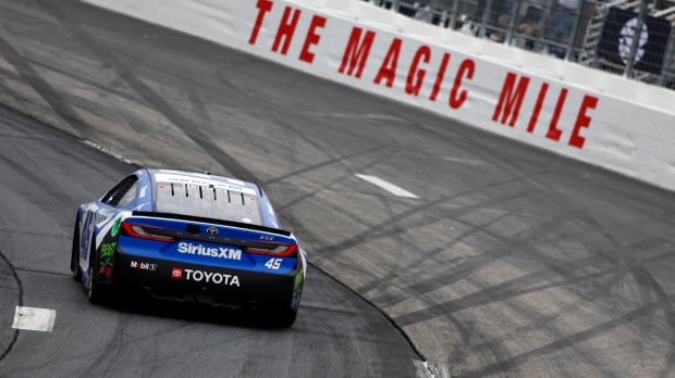 An image of NASCAR Cup Series driver Tyler Reddick driving at New Hampshire Motor Speedway
