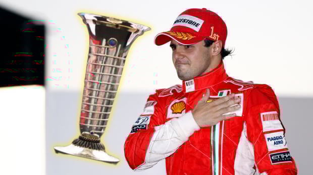 Felipe Massa beats his chest next to a composite of F1's drivers title trophy
