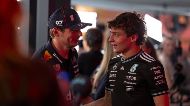 Max Verstappen talking to Kimi Antonelli in Qatar