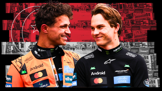 Norris and Piastri smiling in front of Singapore flag background