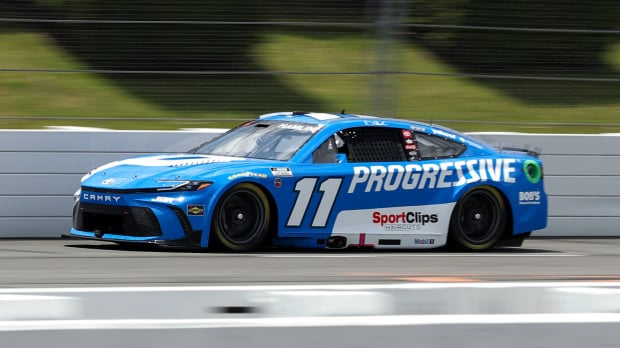 An image of NASCAR's Denny Hamlin driving the No. 11 at Pocono