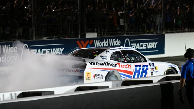 An image of NASCAR driver Connor Zilisch celebrating his win at Gateway