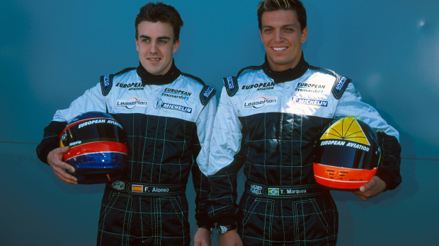 Fernando Alonso stands with Tarso Marques at a Minardi 2001 launch