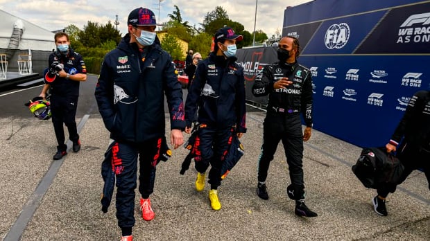 Lewis Hamilton talks with Sergio Perez and Max Verstappen after Imola qualifying