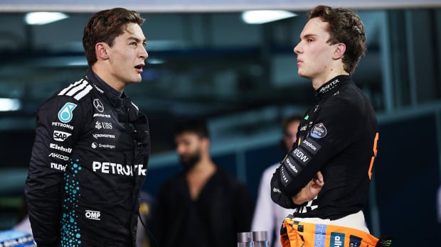 Oscar Piastri narrowly avoided a pit-lane collision with George Russell