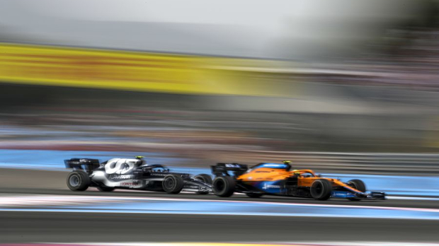 Pierre Gasly and Lando Norris wheel to wheel in France