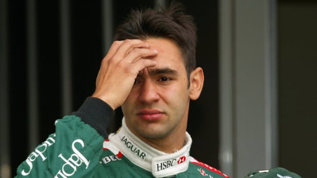Antonio Pizzonia looks concerned in his F1 race suit back in 2003