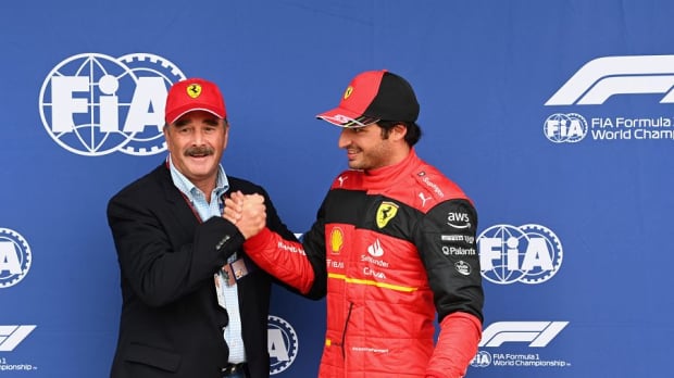 Carlos Sainz and Nigel Mansell after clinching British GP pole