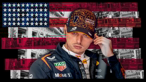Verstappen looking concentrated as he puts an earphone in with a US-flag themed background