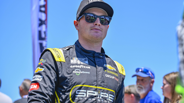 An image of NASCAR driver Justin Haley walking off the track