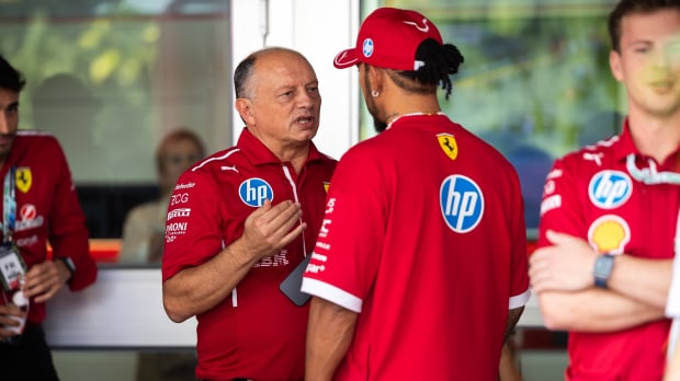 Hamilton with Ferrari team principal Fred Vasseur.
